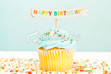 stock-photo-19091817-happy-birthday-cupcake